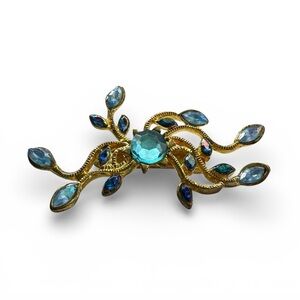 “Sassy & Chic” Brooch. Gold Toned Setting with Blue Gems. Vintage and Whimsical.